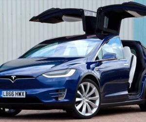 Tesla 疑通过 OTA 升级限制电池容量，系统更新后续航下跌 20%，被车主联合怒告上法庭。